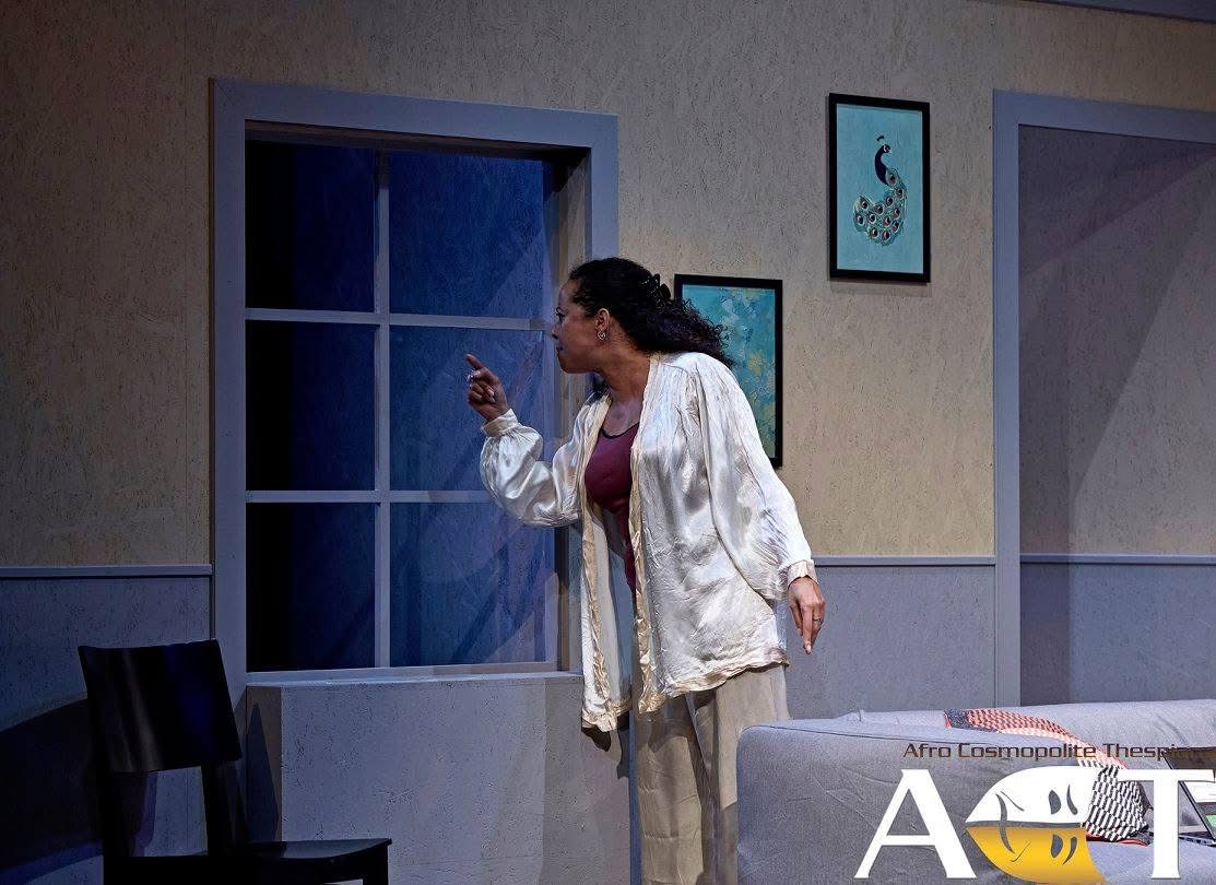 Woman by the window in An Enemy of the People.