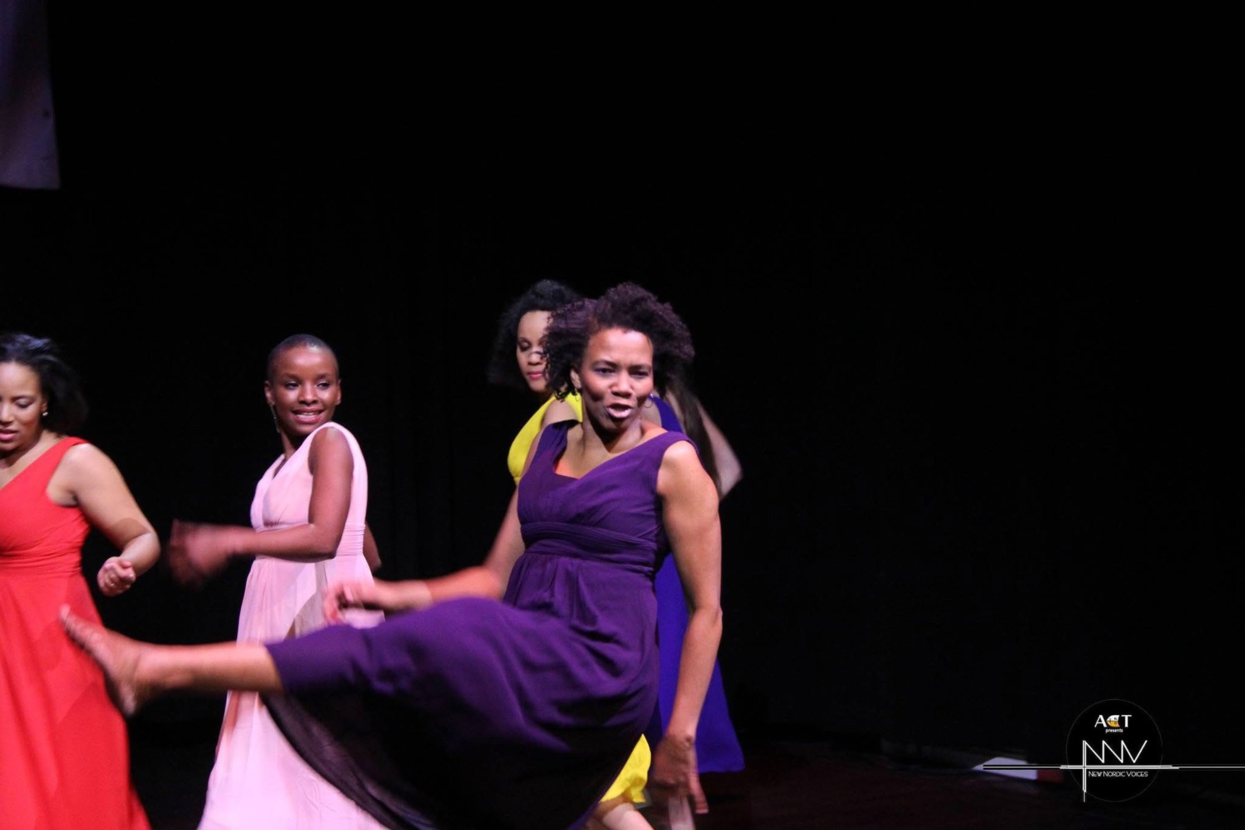 A vivid moving stage image from For Colored Girls.
