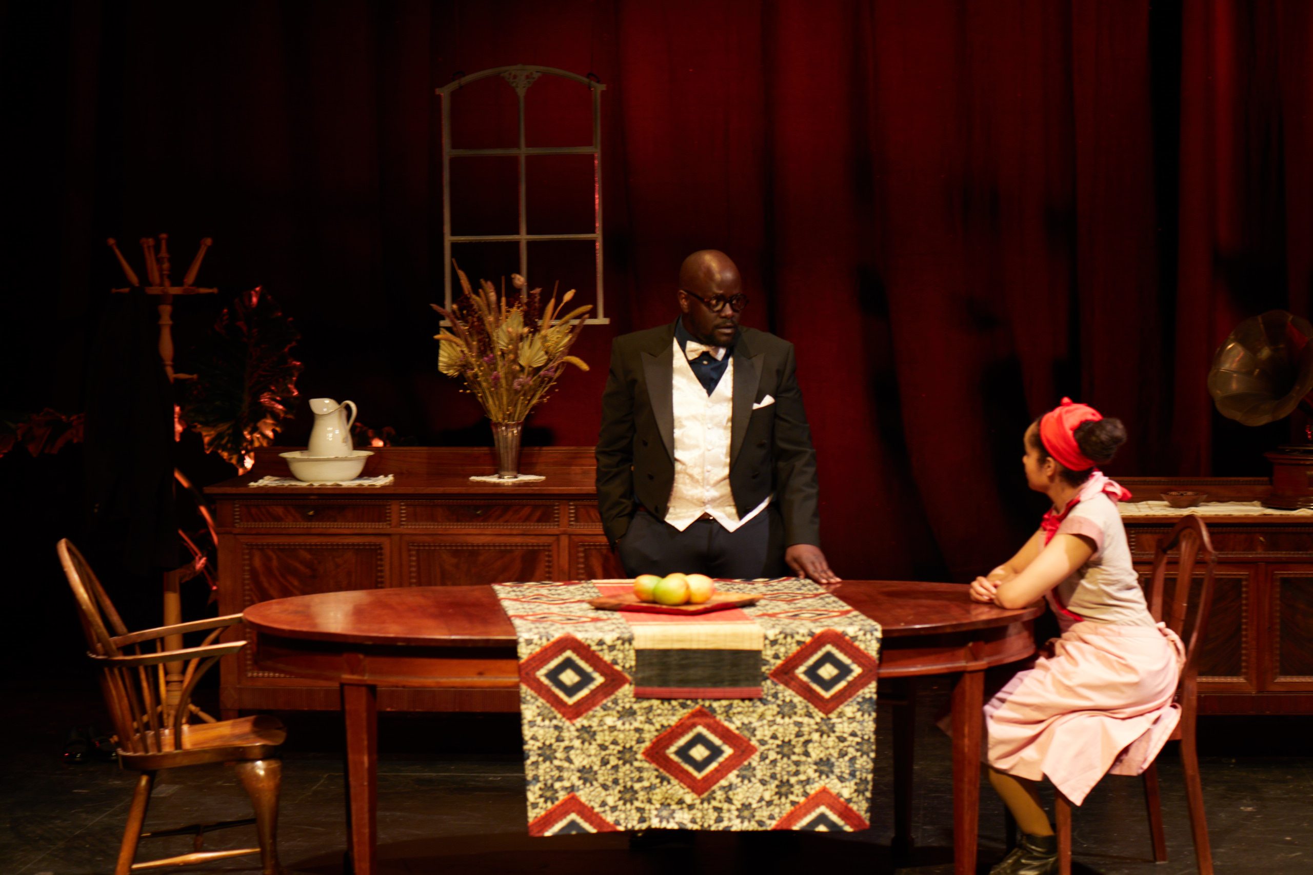 Wide stage image from Miss Julie’s Happy Valley showing the domestic interior.